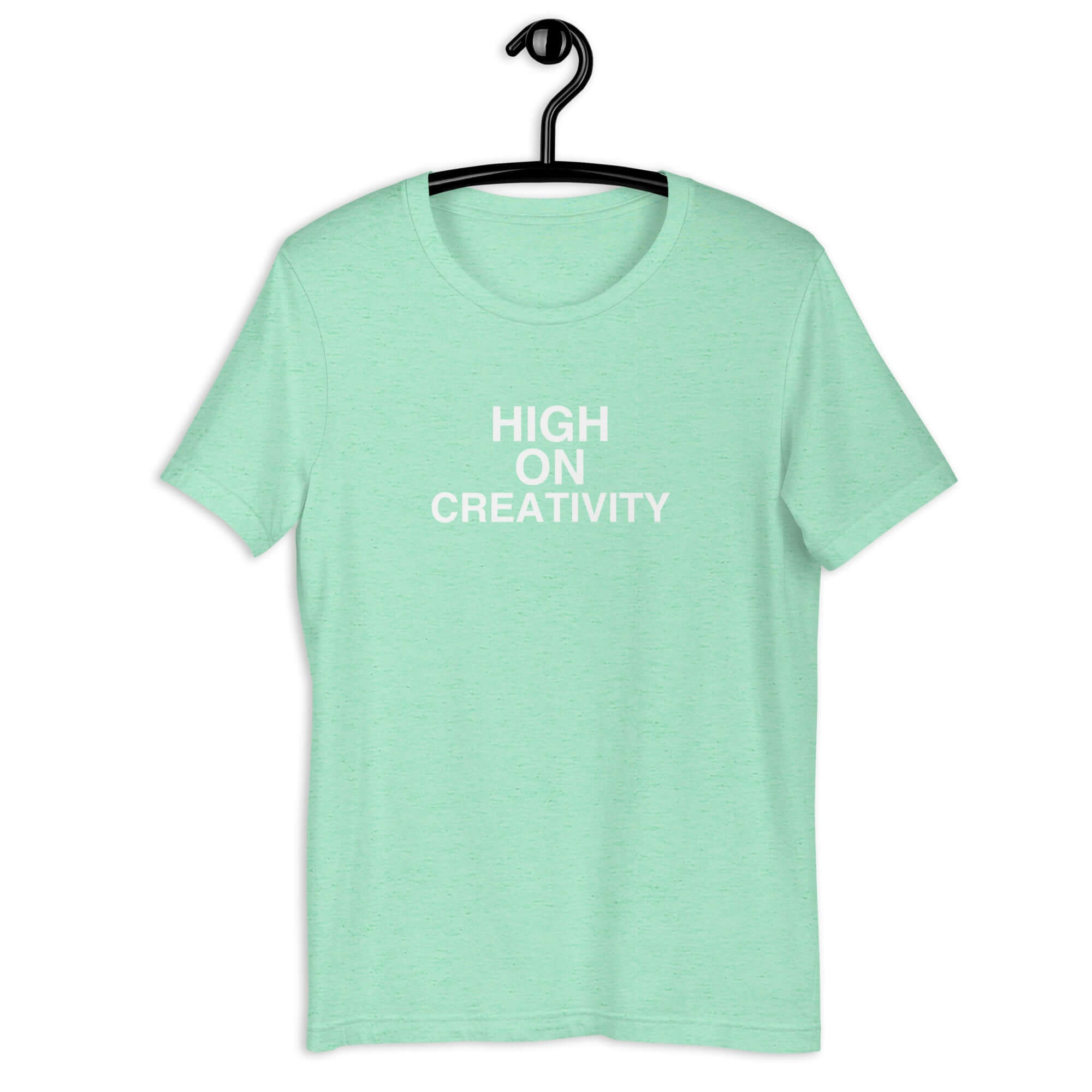 Mint t-shirt on a hanger with the phrase “HIGH ON CREATIVITY” printed in white, centered on the chest.
