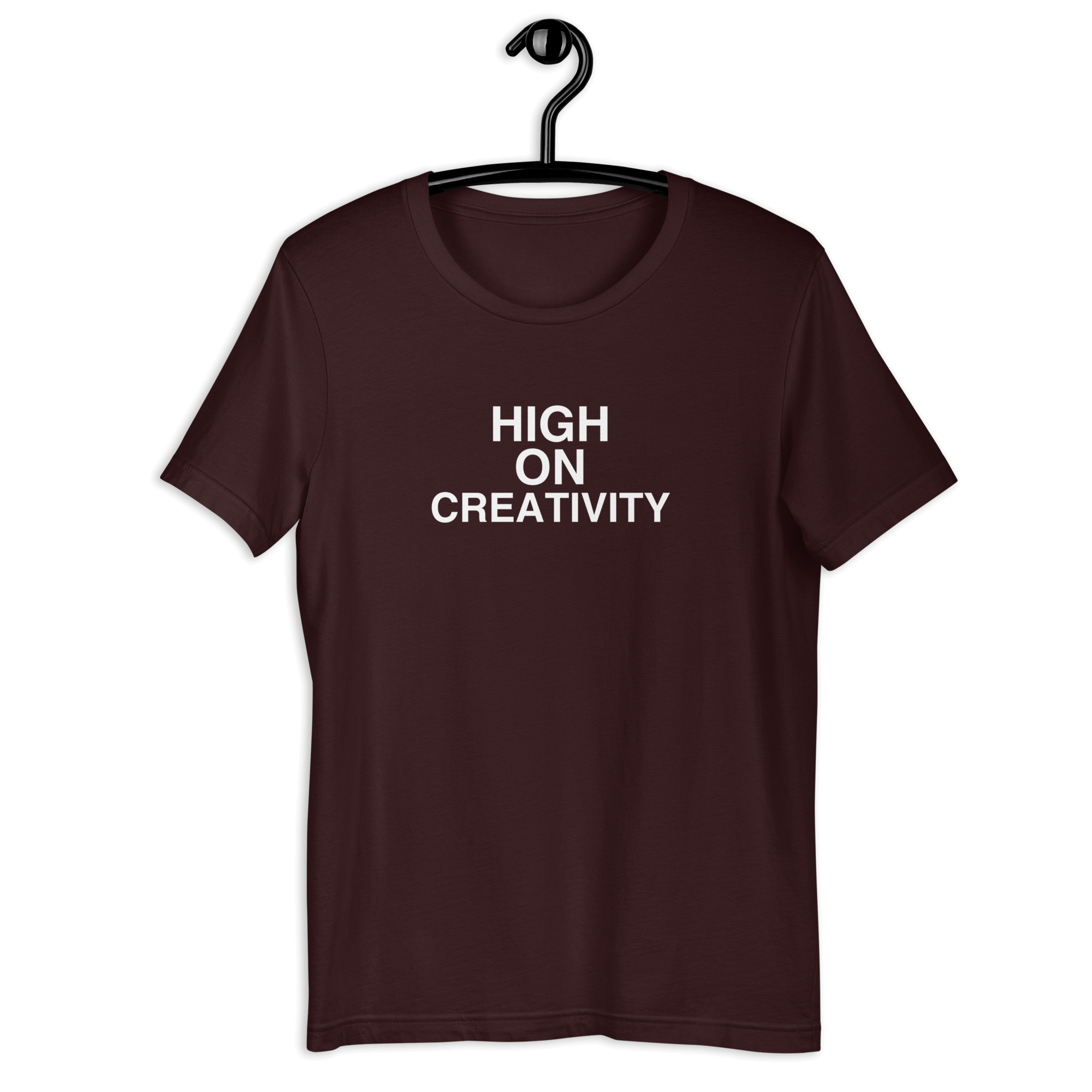 Oxblood black t-shirt on a hanger with the phrase “HIGH ON CREATIVITY” printed in white, centered on the chest.