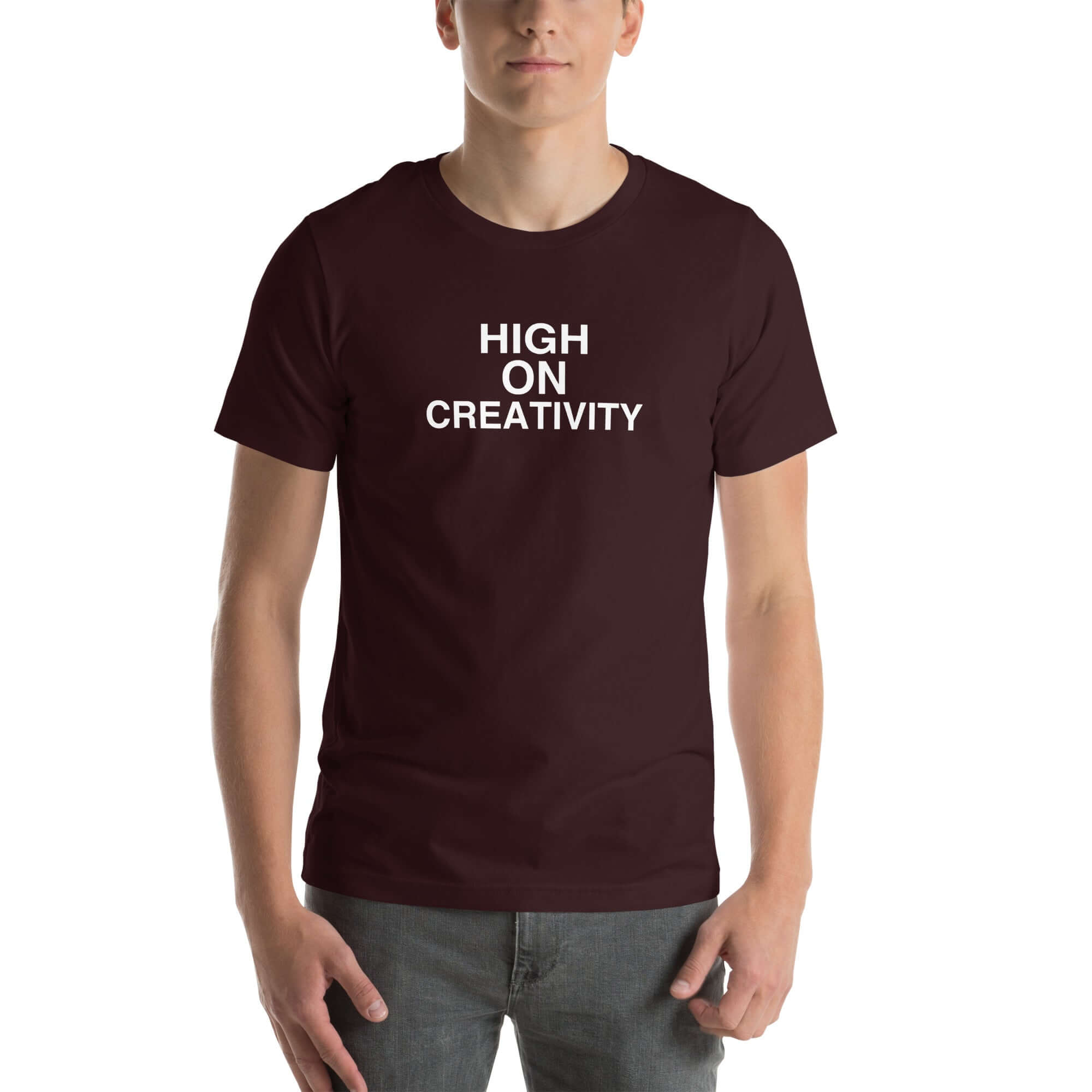 Man wearing a oxblood black t-shirt with the text ‘HIGH ON CREATIVITY’ in bold white capital letters, centered on the chest