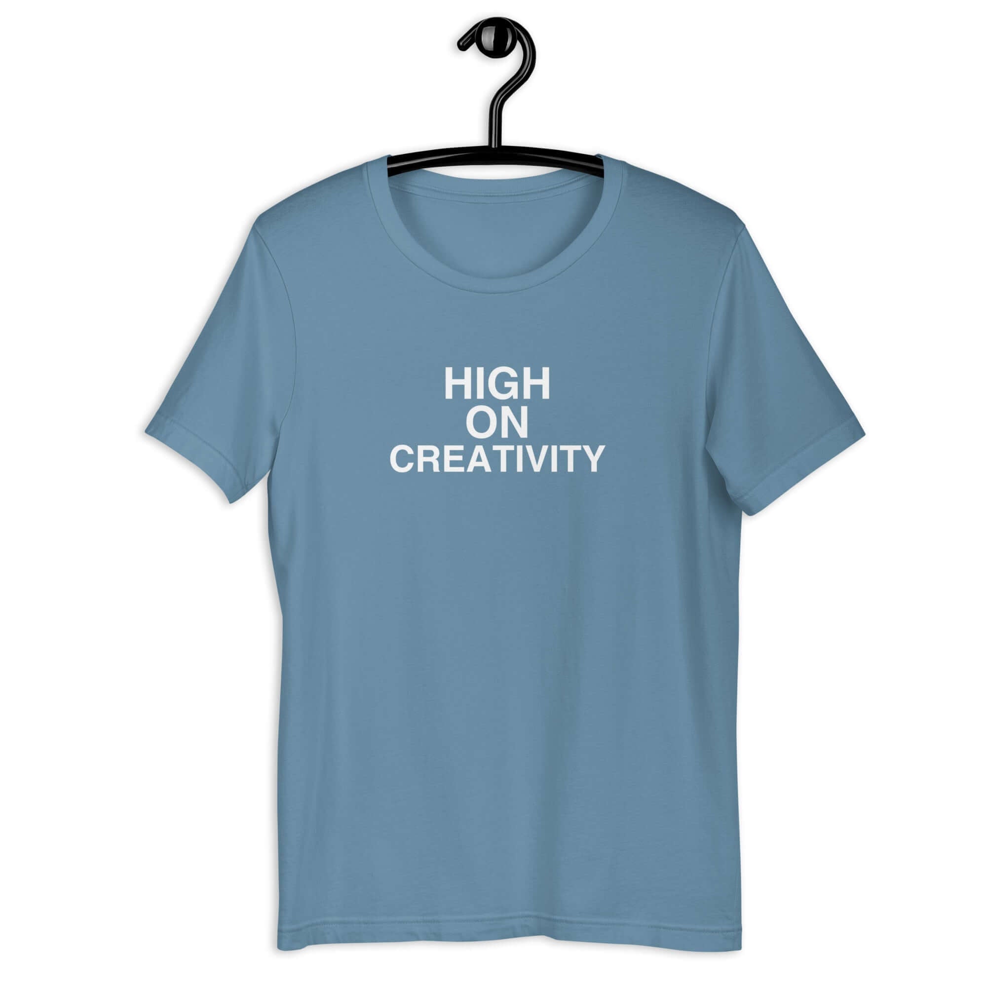 Steel Blue t-shirt on a hanger with the phrase “HIGH ON CREATIVITY” printed in white, centered on the chest.
