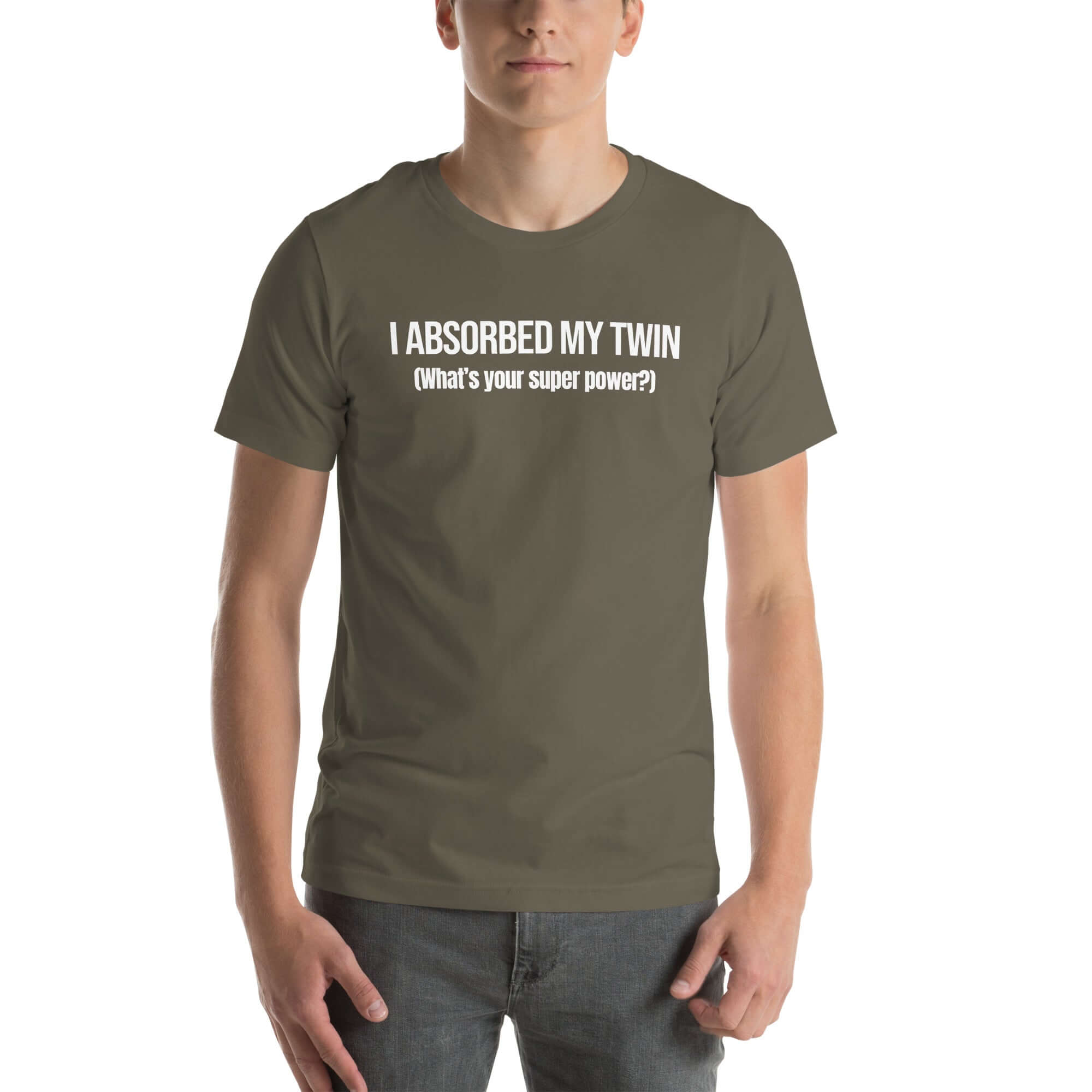 Man wearing army “I ABSORBED MY TWIN (What’s your super power?)” t-shirt, standing facing forward with hands relaxed.        