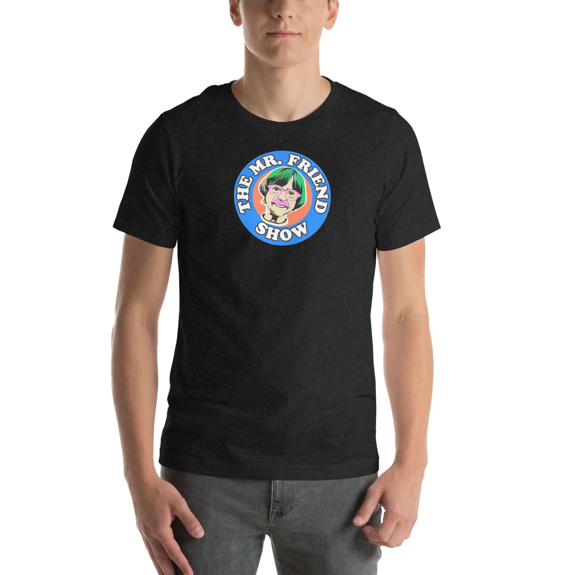Man wearing a black t-shirt featuring 'The Mr. Friend Show' logo with a colorful illustrated portrait and retro-style typography