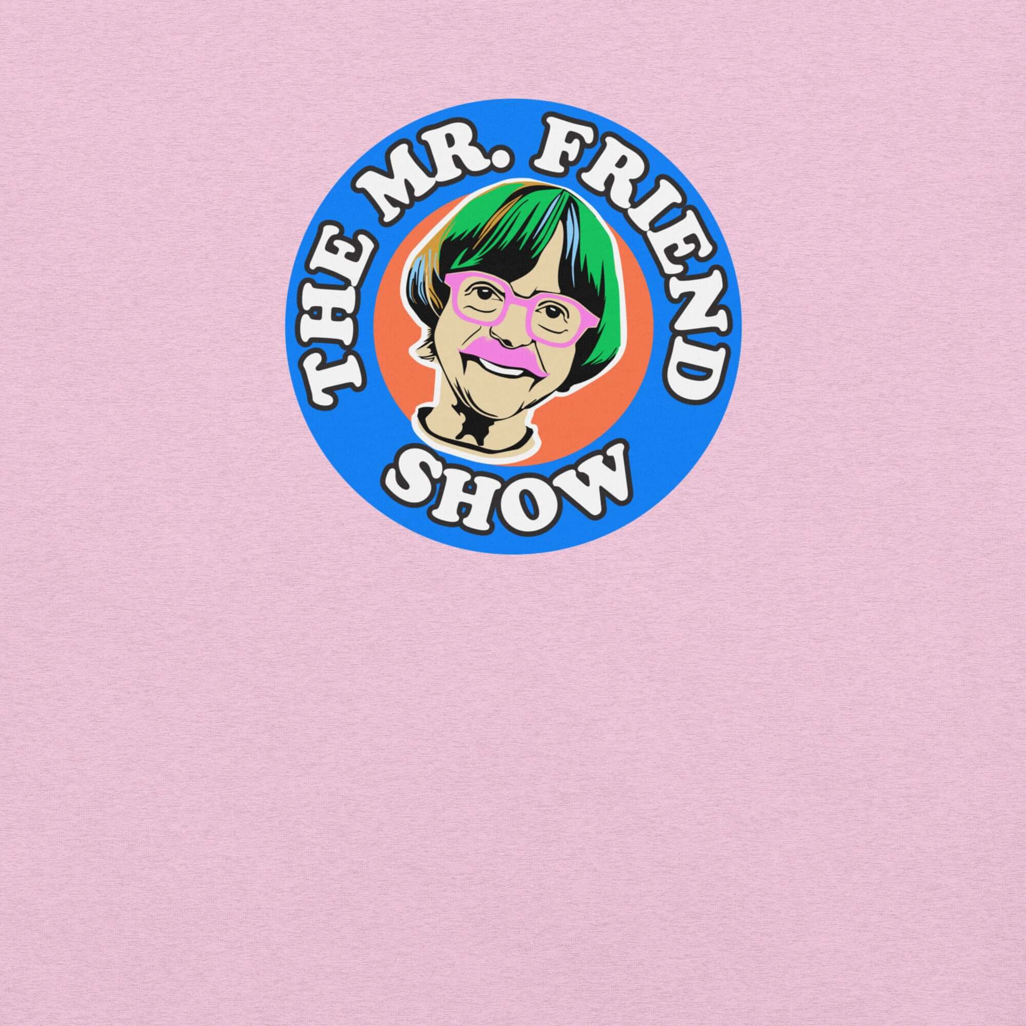 The Mr. Friend Show logo featuring a colorful illustrated portrait of an elderly person with green hair, pink glasses, and a pink mustache, on a pink t-shirt background.