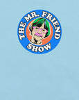 Man wearing a light blue t-shirt featuring 'The Mr. Friend Show' logo with a colorful illustrated portrait and retro-style typography