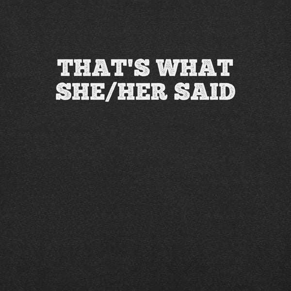 Close-up of black t-shirt with bold white text “THAT’S WHAT SHE/HER SAID” across the chest