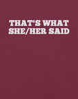 Close-up of maroon t-shirt with bold white text “THAT’S WHAT SHE/HER SAID” across the chest
