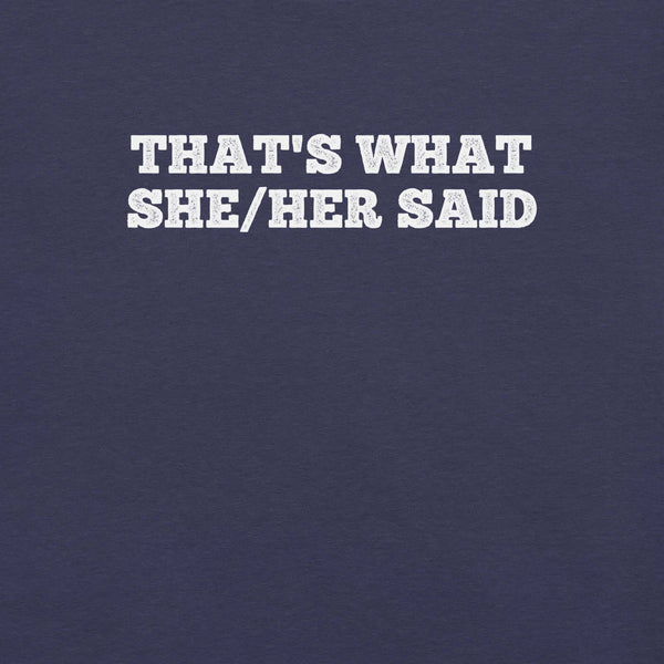 Close-up of navy t-shirt with bold white text “THAT’S WHAT SHE/HER SAID” across the chest
