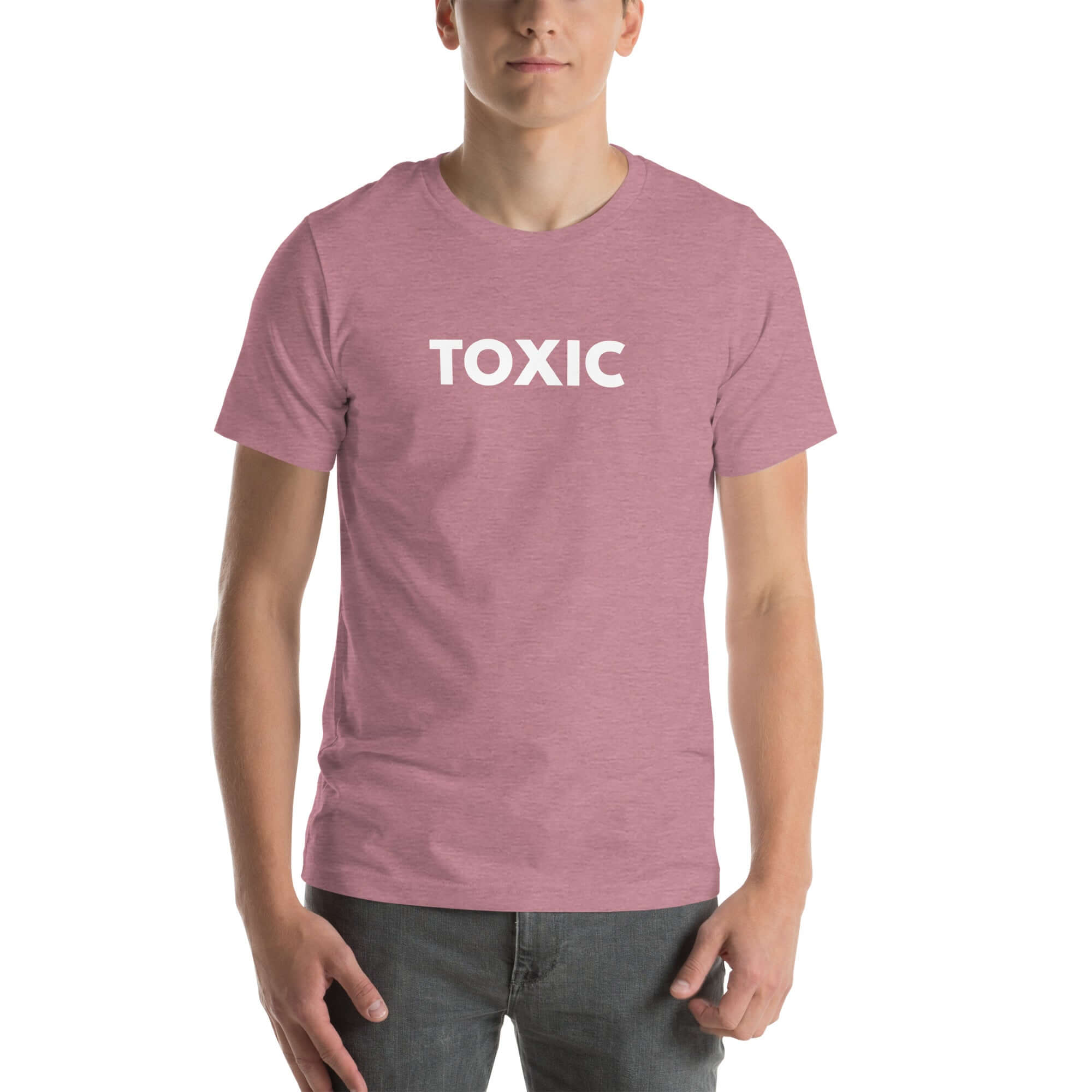 Man wearing orchid “TOXIC” t-shirt, standing straight with hands relaxed by pockets, facing forward.